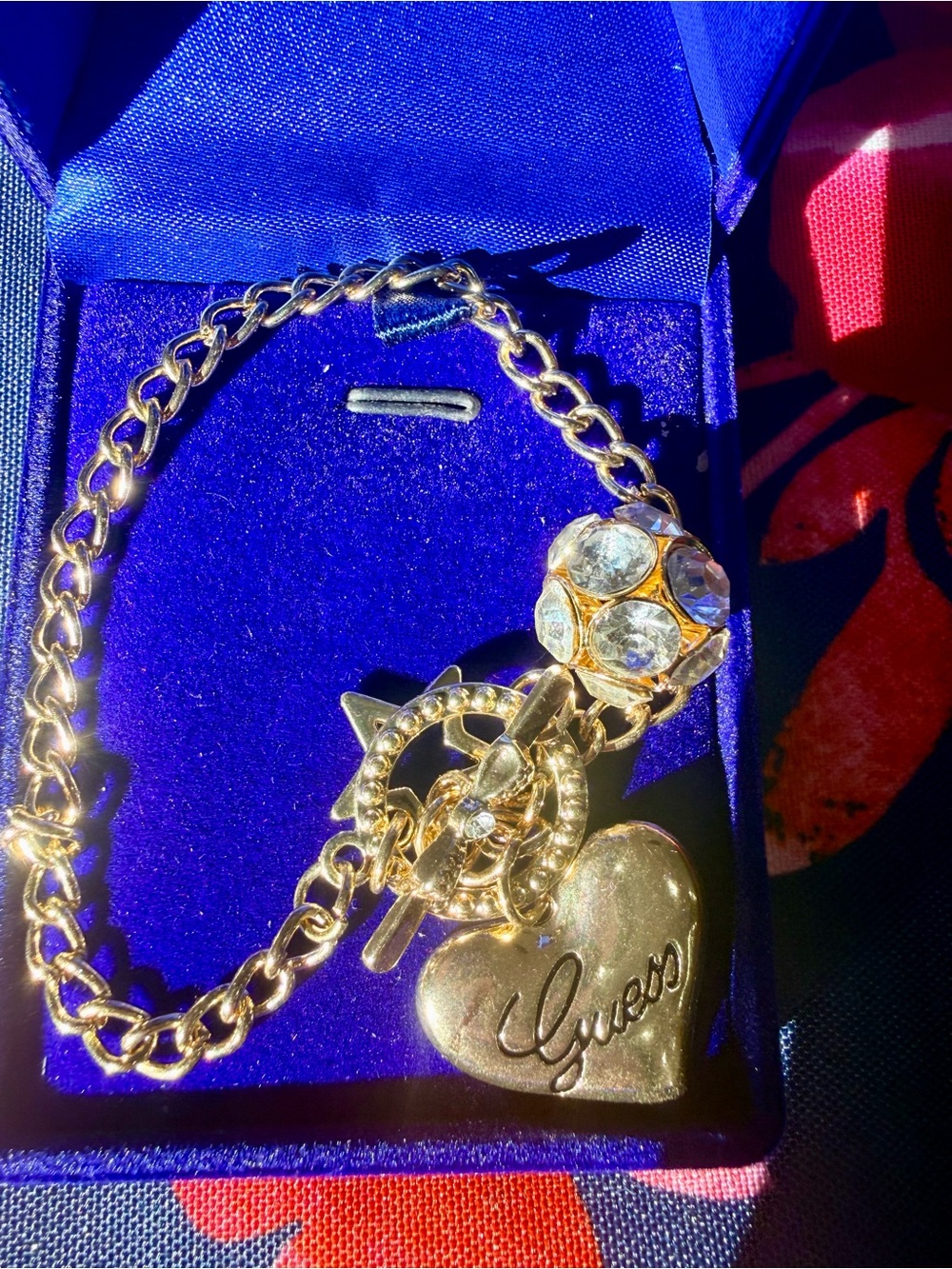 Guess Gold-Tone Heart Charm Bracelet with Crystal Bead